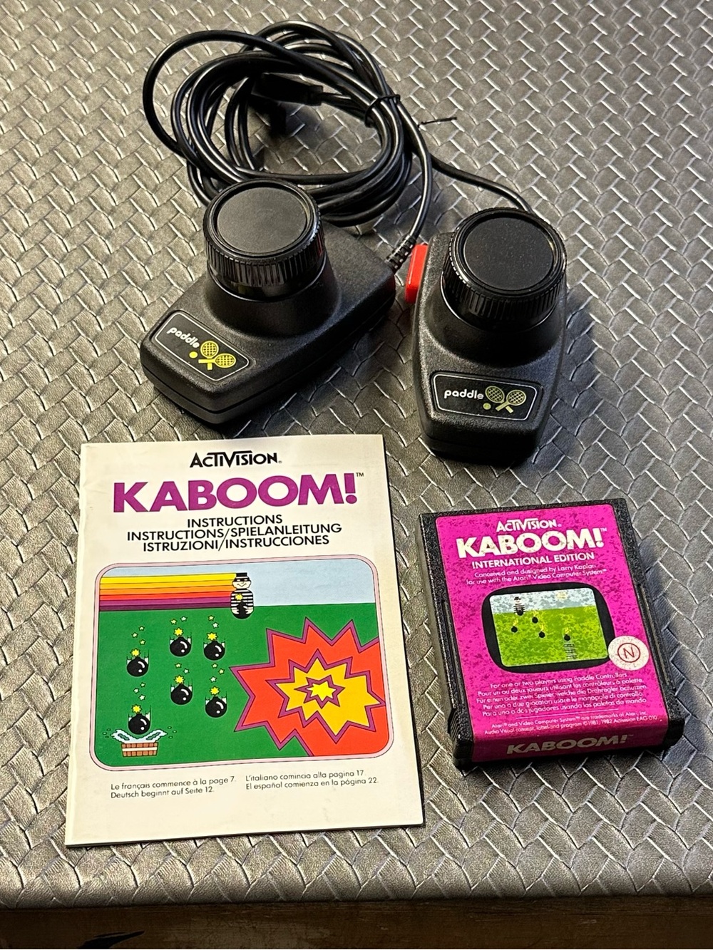 Kaboom! Classic Atari Game Cartridge with Black Paddle Controllers